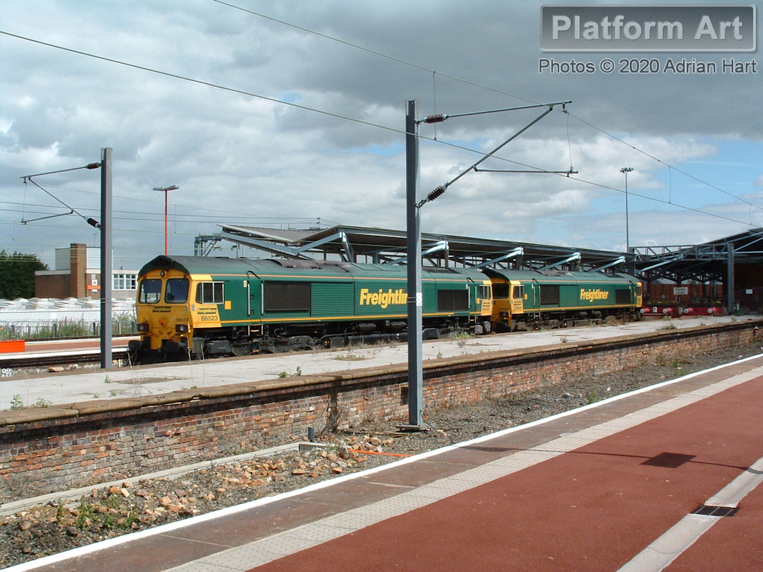 Freightliner locomotives 66523 and 66520 are seen stabled at Rugby between duties on 19th July 2005.