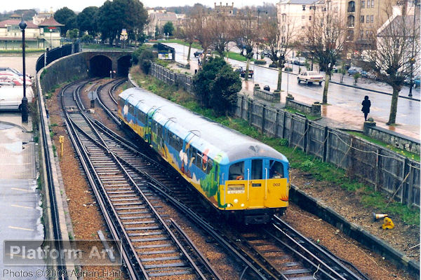 Formed of ex-London Underground stock, Isle of Wight unit 002 is seen arriving at Ryde Harbour on 5th April 2004 with a service from Shanklin.
