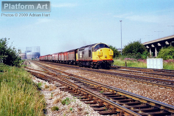 Split headcode Class 37 37008 heads an eastbound Speedlink freight service past Washwood Heath, Birmingham, on 17th July 1990.