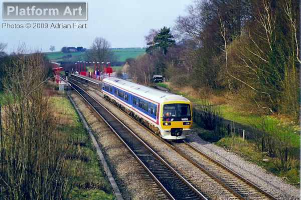 Thames Turbo Class 166 unit 166210 passes Kings Sutton on 24th February 1998 with the 14.10 Stratford-upon-Avon to London Paddington service.